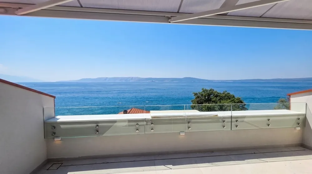 Neubauwohnung im Dachgeschoss direkt am Meer